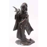 A GOOD JAPANESE MEIJI PERIOD BRONZE OKIMONO OF A GEISHA GIRL & BIRD, the lady stood in traditional