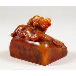 A FINE QUALITY CHINESE CARVED SOAPSTONE SEAL OF A TOAD ON LOTUS LEAF, the seal with a carved toad