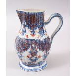 A GOOD 18TH CENTURY CHINESE IMARI PORCELAIN JUG, decorated in typical red imari palate to depict