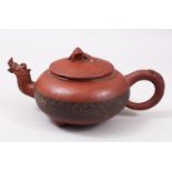 A GOOD 20TH CENTURY CHINESE YIXING CLAY TEAPOT, the teapot with moulded dragon spout and carved body