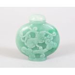 A GOOD 19TH / 20TH CENTURY CHINESE JADE / JADEITE SNUFF BOTTLE, the body with carved floral