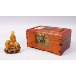 A GOOD CHINESE CARVED SOAPSTONE FIGURE OF LUOHAN - IN A HUANGHUALI WOODEN BOX, the figure of