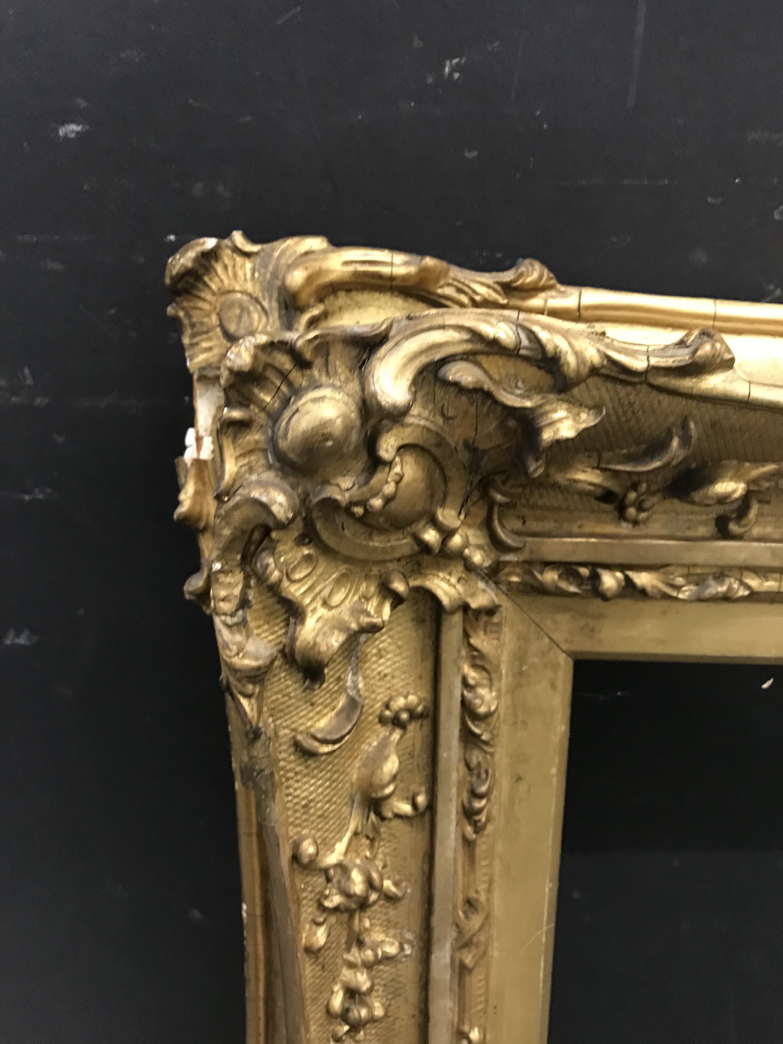 19th Century English School. A Gilt Composition Frame, with swept centres and corners, 19" x 14.