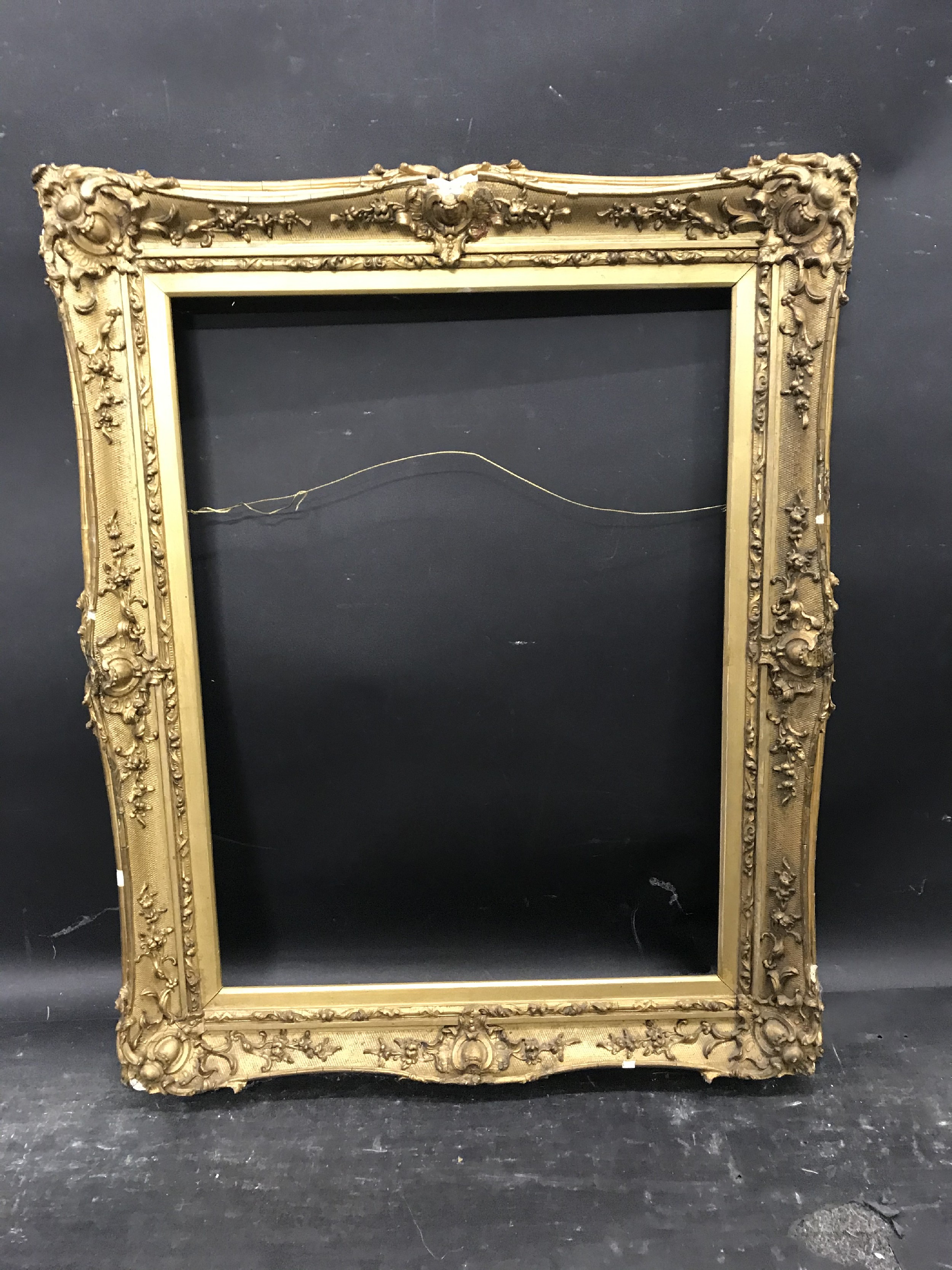 19th Century English School. A Gilt Composition Frame, with swept centres and corners, 19" x 14. - Image 2 of 3