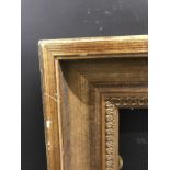 20th Century Continental School. A Gilt Composition Frame, 35.5" x 27.5" (rebate).