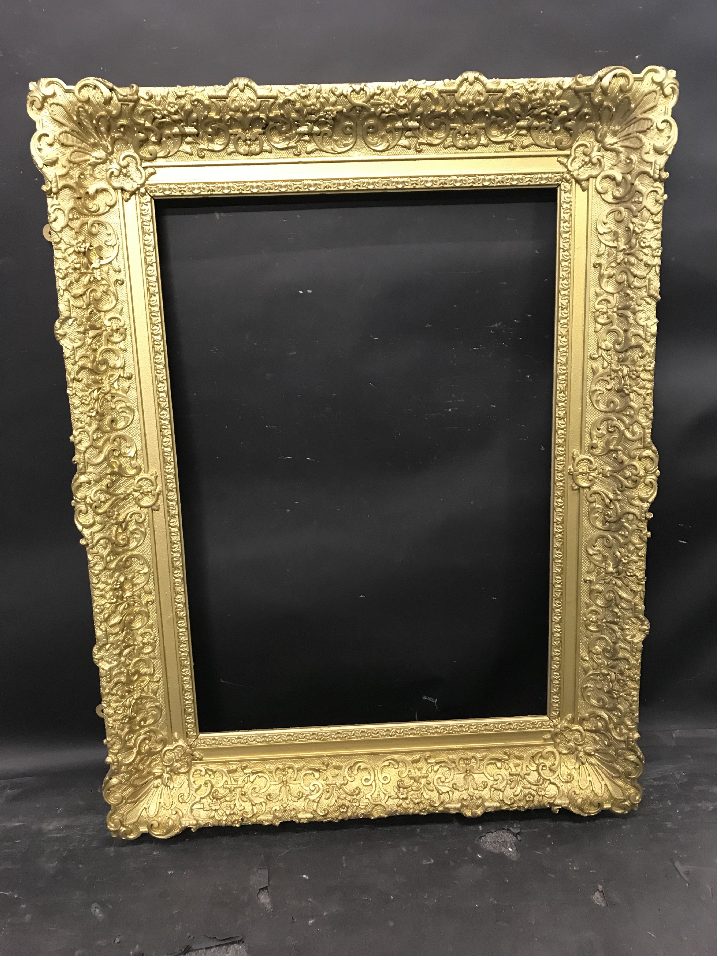 19th Century English School. A Gilt Composition Frame, with swept centres and corners, 32" x 22" ( - Image 2 of 3