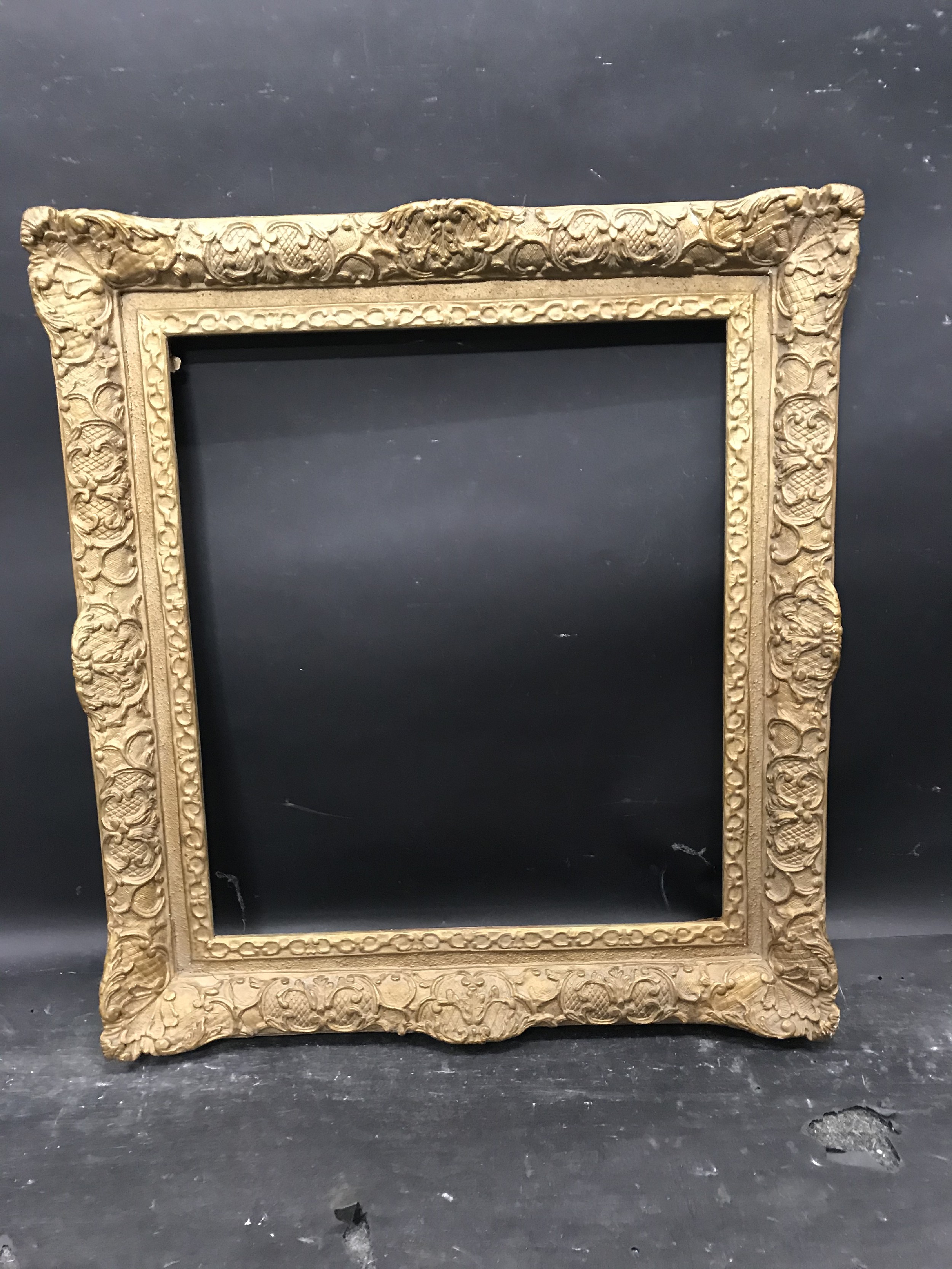20th Century English School. A Gilt Composition Frame, with swept centres and corners, 19.25" x 16. - Image 2 of 3