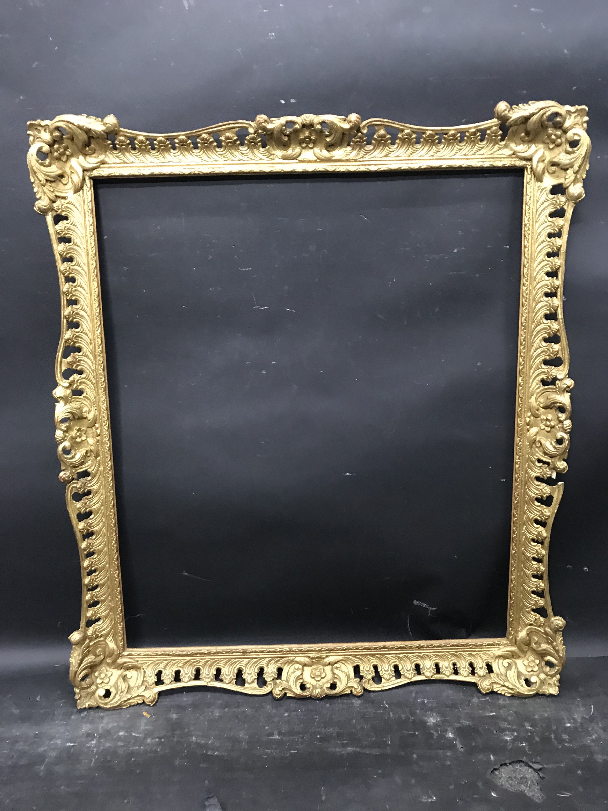 20th Century English School. A Gilt Composition Frame, with swept and pierced centres and corners, - Image 2 of 3