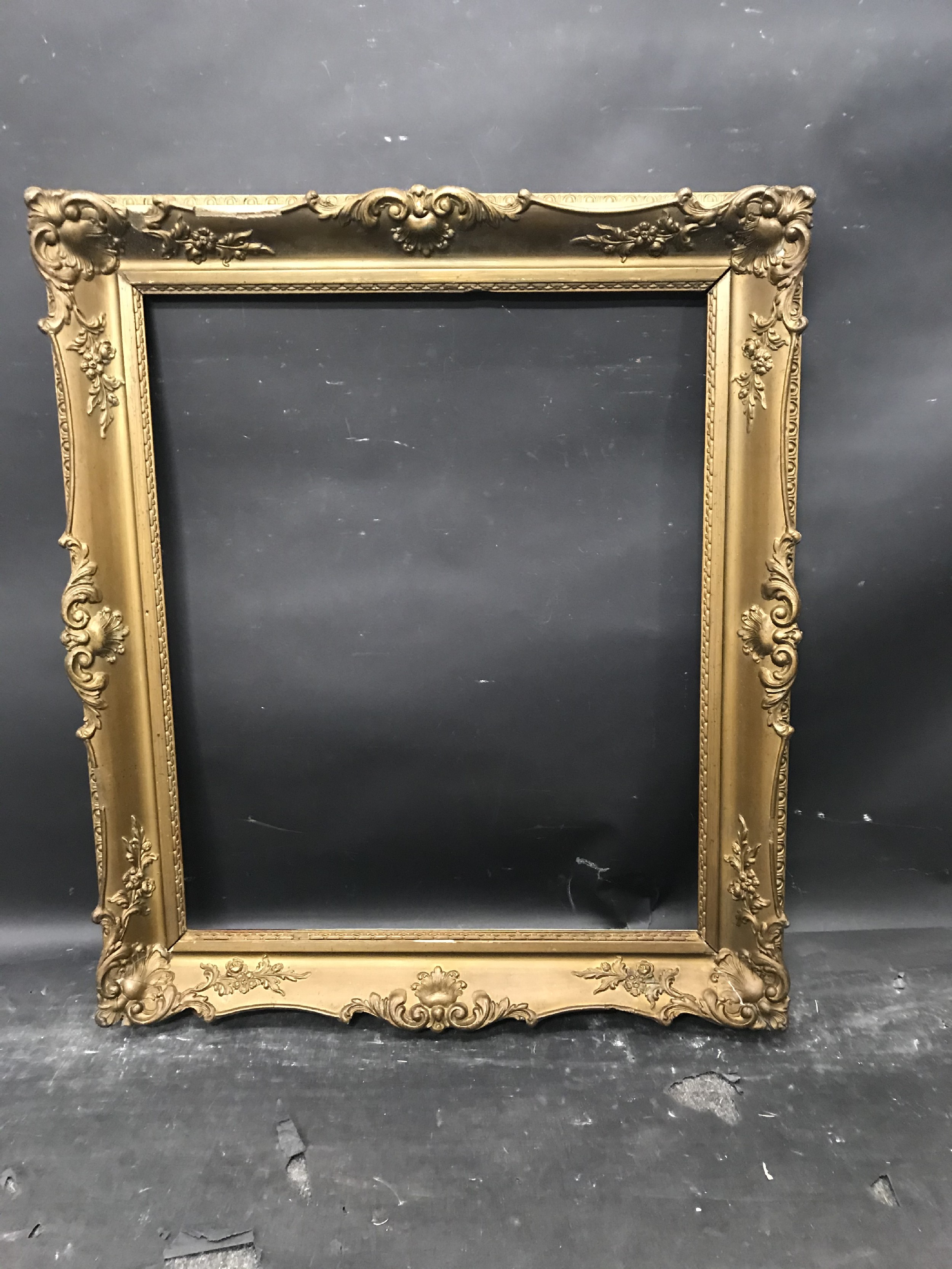 19th Century English School. A Gilt Composition Frame, with swept centres and corners, 23.75" x - Image 2 of 3