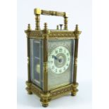 19TH CENTURY GILT BRASS, 4 GLASS REPEATER CARRIAGE CLOCK, ENAMELLED CHAPTER RING WITHIN AN