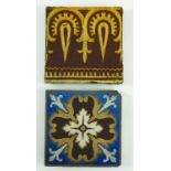 2 ENCAUSTIC TYPE TILES, EACH APPROX. 15 cm SQUARE, ONE MARKED MINTON, THE OTHER INDISTINCTLY MARKED