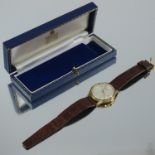 GENTS GARRARD AND CO. LTD. GOLD AUTOMATIC WRIST WATCH , CIRCA 1970S, CHAMPAGNE DIAL , DATE APERTURE,