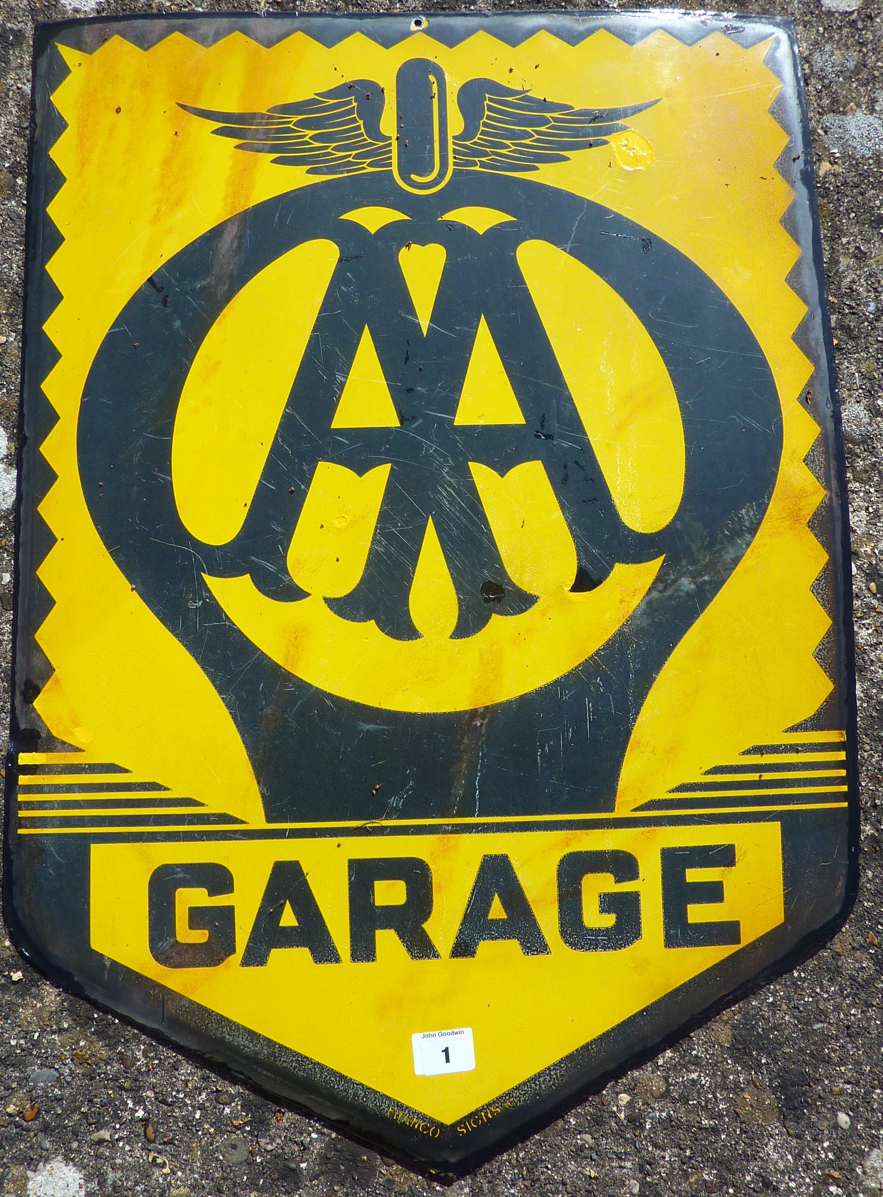 ENAMEL ADVERTISING SIGN AA GARAGE, APPROX. 22 INS. X 31 INS. SOME TOUCHING, FRANCO