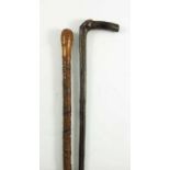 CARVED BAMBOO WALKING STICK WITH ORIENTAL STYLE DECORATION AND ONE OTHER