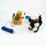BATTERY OPERATED TOYS; 'PLAYFUL PUPPY' AND 'NAUGHTY POODLE', BOTH BOXED