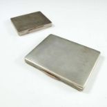 2 SILVER CIGARETTE CASES WITH ENGINE TURNED DECORATION, YELLOW METAL CLASPS AND GILT METAL LINING,
