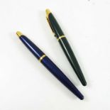 2 DUNHILL TORPEDO SHAPED FOUNTAIN PENS, EACH WITH 18K GOLD NIBS, PURPLE AND GREEN