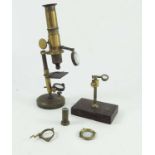 BANKS, LONDON MAKERS TO THE PRINCE OF WALES FIELD MICROSCOPE AND A BRASS MICROSCOPE