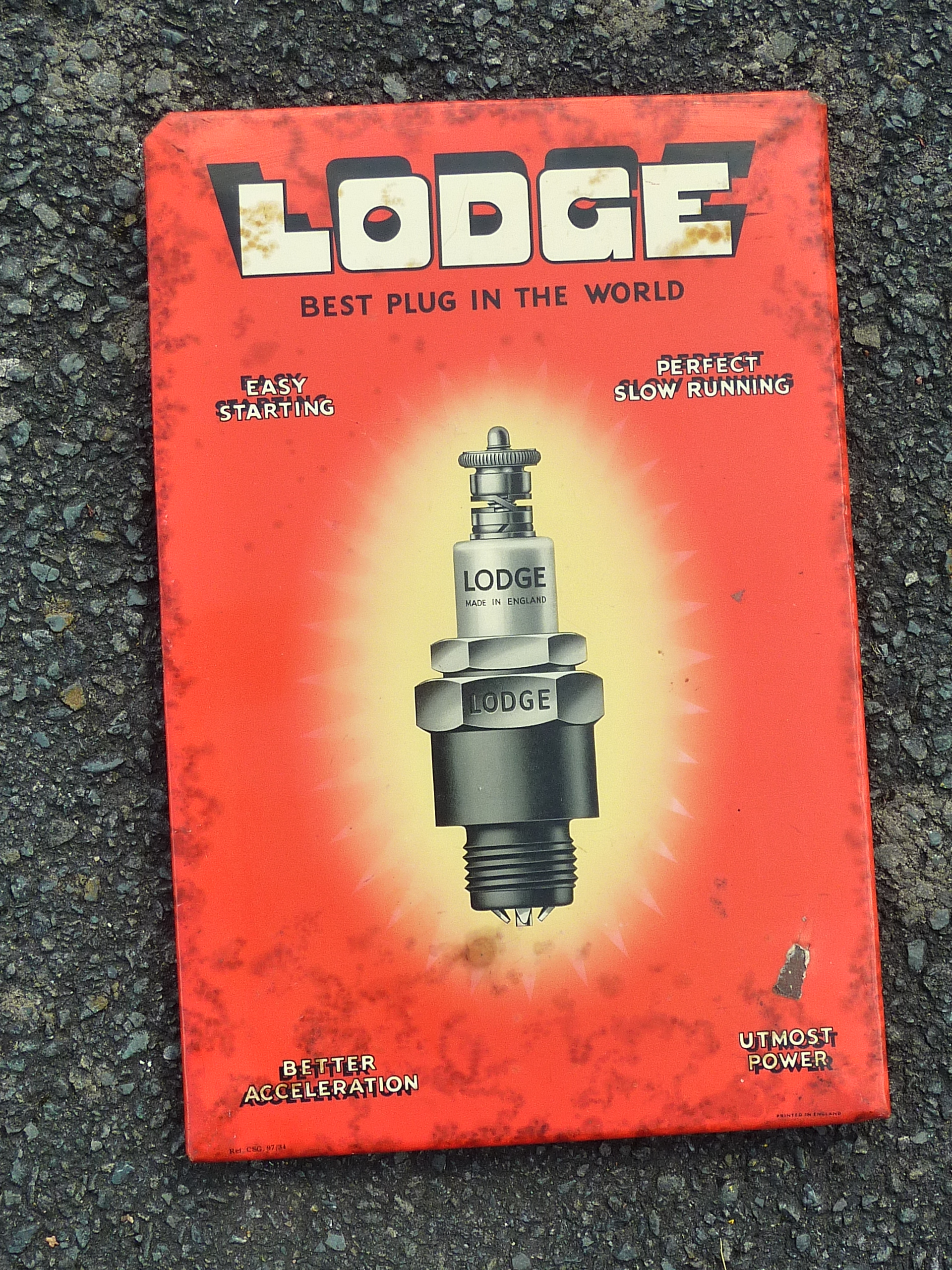 SMALL TIN ADVERTISING SIGN LODGE BEST PLUGS IN THE WORLD APPROX. 8 INS. X 12 INS 20-40