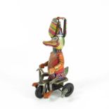GERMAN CLOCKWORK DUCK ON A TRICYCLE WITH PROPELLER HAT, PROBABLY JW TOYS