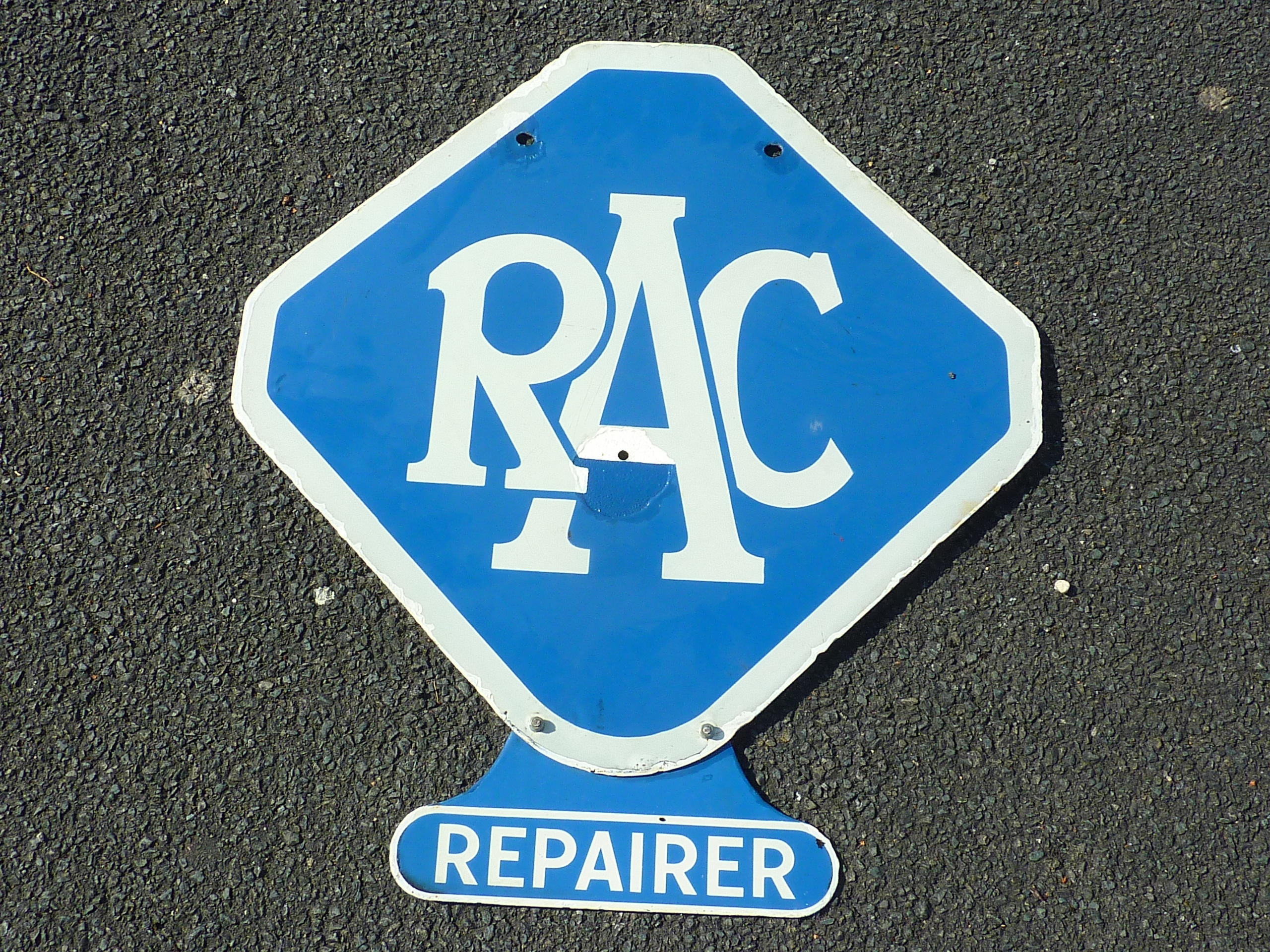 DOUBLED SIDED ENAMELLED SIGN RAC WITH REPAIRER TAG ON THE BOTTOM APPROX. 25 INS. X 22 INS. SOME