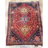 RED GROUND RUG, APPROX. 160 X 115 cm