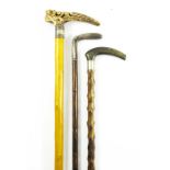 COLLECTION OF WALKING STICKS, ONE WITH CARVED ANTLER HANDLE DEPICTING A GROUP OF MONKEYS, ONE WITH