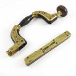 A WOOD AND BRASS CARPENTERS BRACE BY WILLIAM MARPLES, SHEFFIELD 'MAKERS OF THE ULTIMATE FRAMED