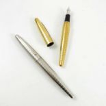 2 DUNHILL TORPEDO SHAPED FOUNTAIN PENS, GOLD AND SILVER COLOUR, EACH WITH 18K GOLD NIB