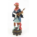 SPELTER FIGURE DEPICTING MINSTREL ON STAND WITH LATER DECORATION, APPROX. 50 cm H.