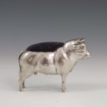 AN UNUSUAL SILVER PIN CUSHION IN THE FORM OF A BULL, THE MAKERS MARK AND HALLMARKS ARE RUBBED,