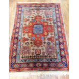 RED GROUND RUG, APPROX. 184 X 123 cm