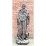 LARGE CARVED WOOD STATUE DEPICTING ST.BENEDICT, WITH AN EAGLE AT HIS FOOT AND INDISTINCT LATIN