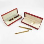 2 DUPONT PEN AND PENCIL SETS WITH BOXES, ONE LAQUE DE CHINE AND ONE GOLD COLOURED