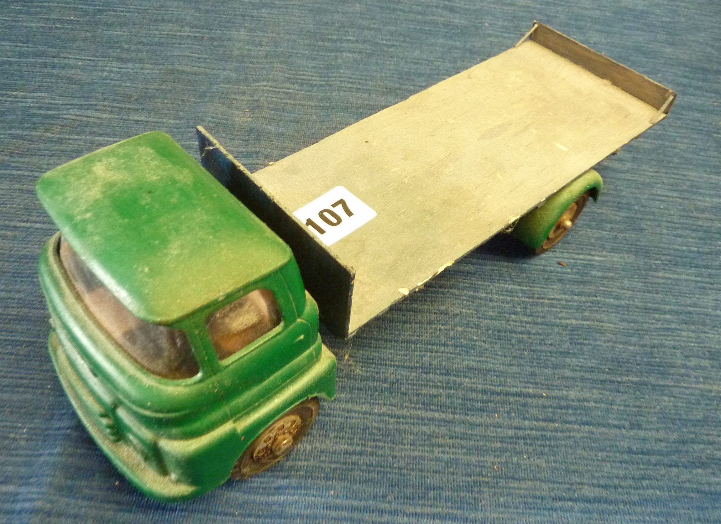 EARLY LARGE SCALE TRIANG LORRY CHASSIS WITH BALSA FLAT BED IN NEED OF SPARES OR REPAIR