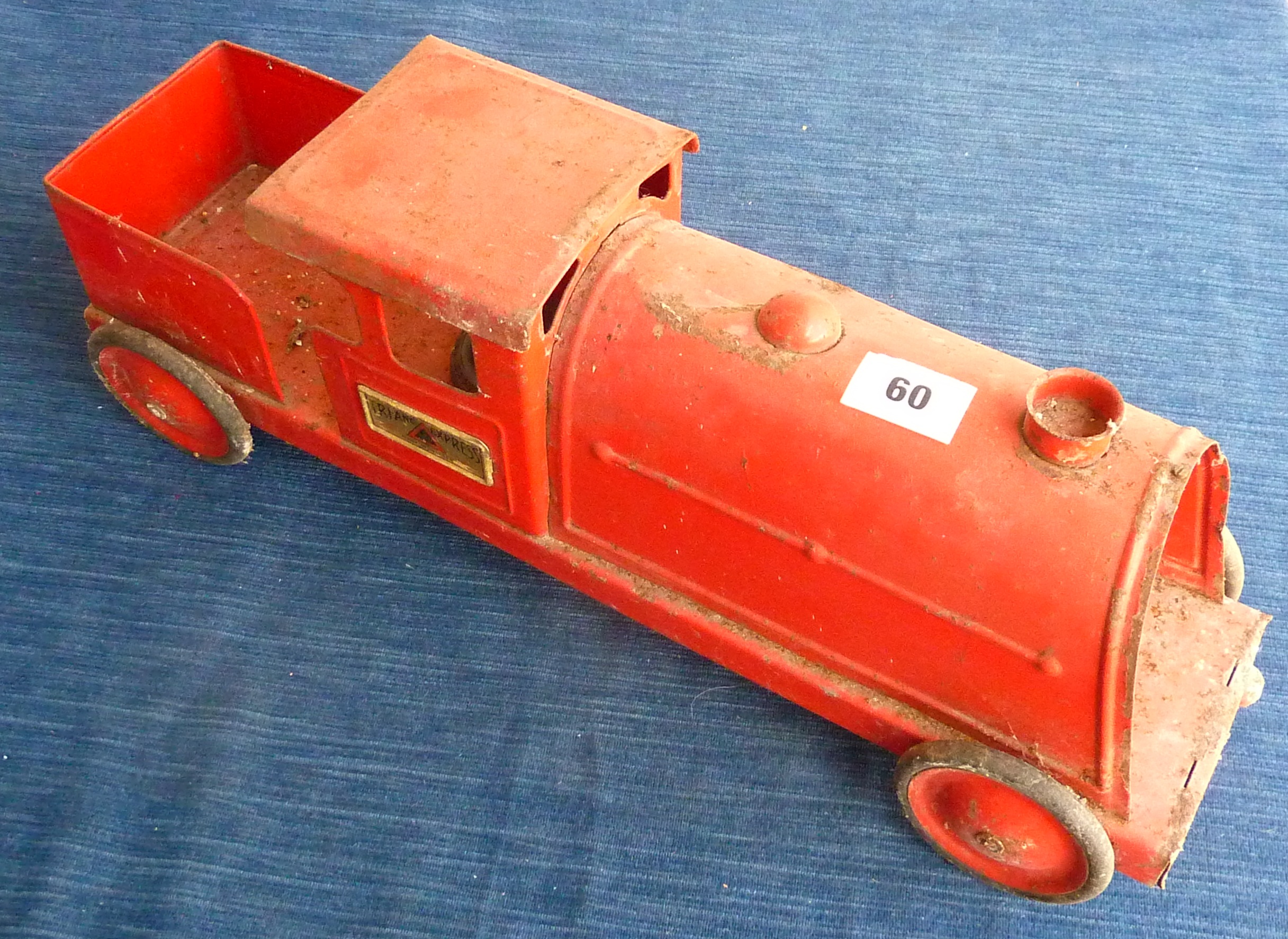 TRIANG EXPRESS TINPLATE PULL ALONG MODEL RAILWAY ENGINE AND A CHILDS ROCKING HORSE