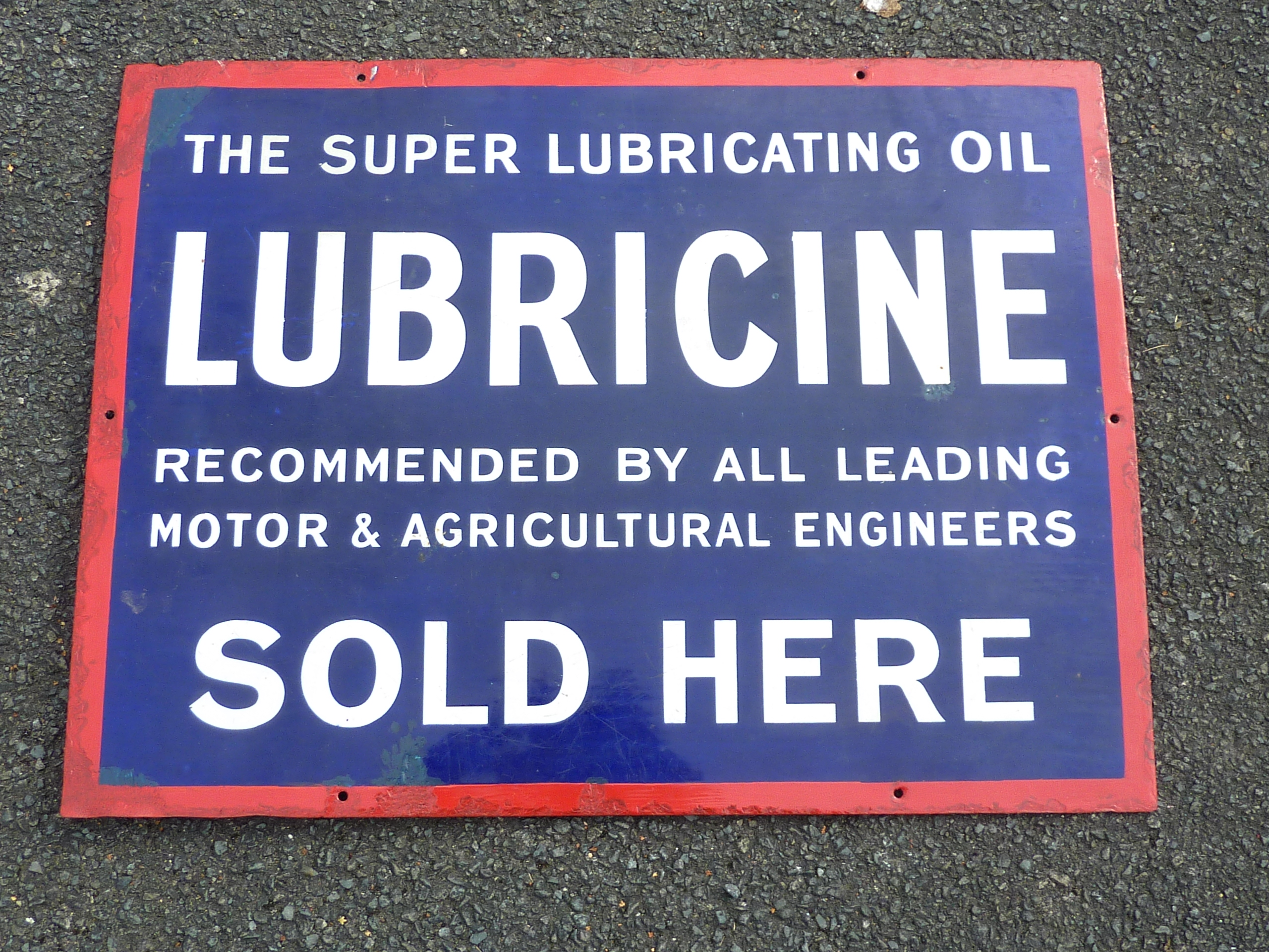 ENAMELLED SIGN LUBRICINE, THE SUPER LUBRICATING OIL SOLD HERE APPROX. 24 INS. X 18 INS.