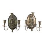 A pair of silver plate wall sconces