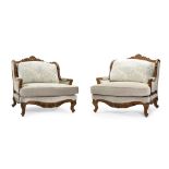 A pair of oversized French Provincial-style chairs