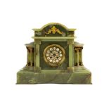 A Victorian green onyx mantle clock