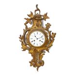 A Louis XV-style gilt-bronze cartel clock