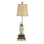 A metal-mounted stone table lamp