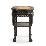 A Chinese carved hardwood plant stand