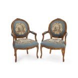 A pair of French-style armchairs
