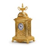 A modern French-style gold doré mantle clock
