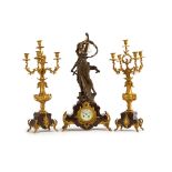 A spelter clock set, three pieces