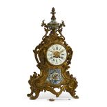 A French bronze and champlevé mantle clock