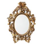 A carved giltwood wall mirror