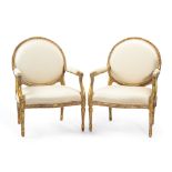 A pair of antiqued chairs