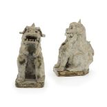 A pair of Asian stoneware foo lions